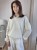Sweter Liv śmietankowy 100% wełna merino, dekolt V-neck